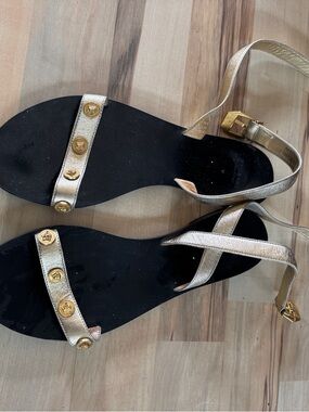 Versace Gold and Black Strappy Sandals with Medallion Accents